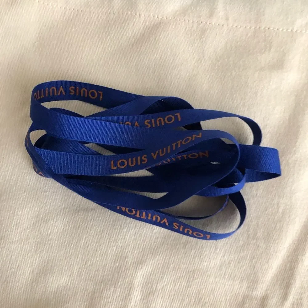 Louis Vuitton dust bag and ribbon